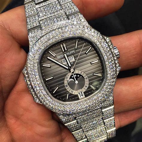 patek philippe iced out cheap|patek philippe gold nautilus price.